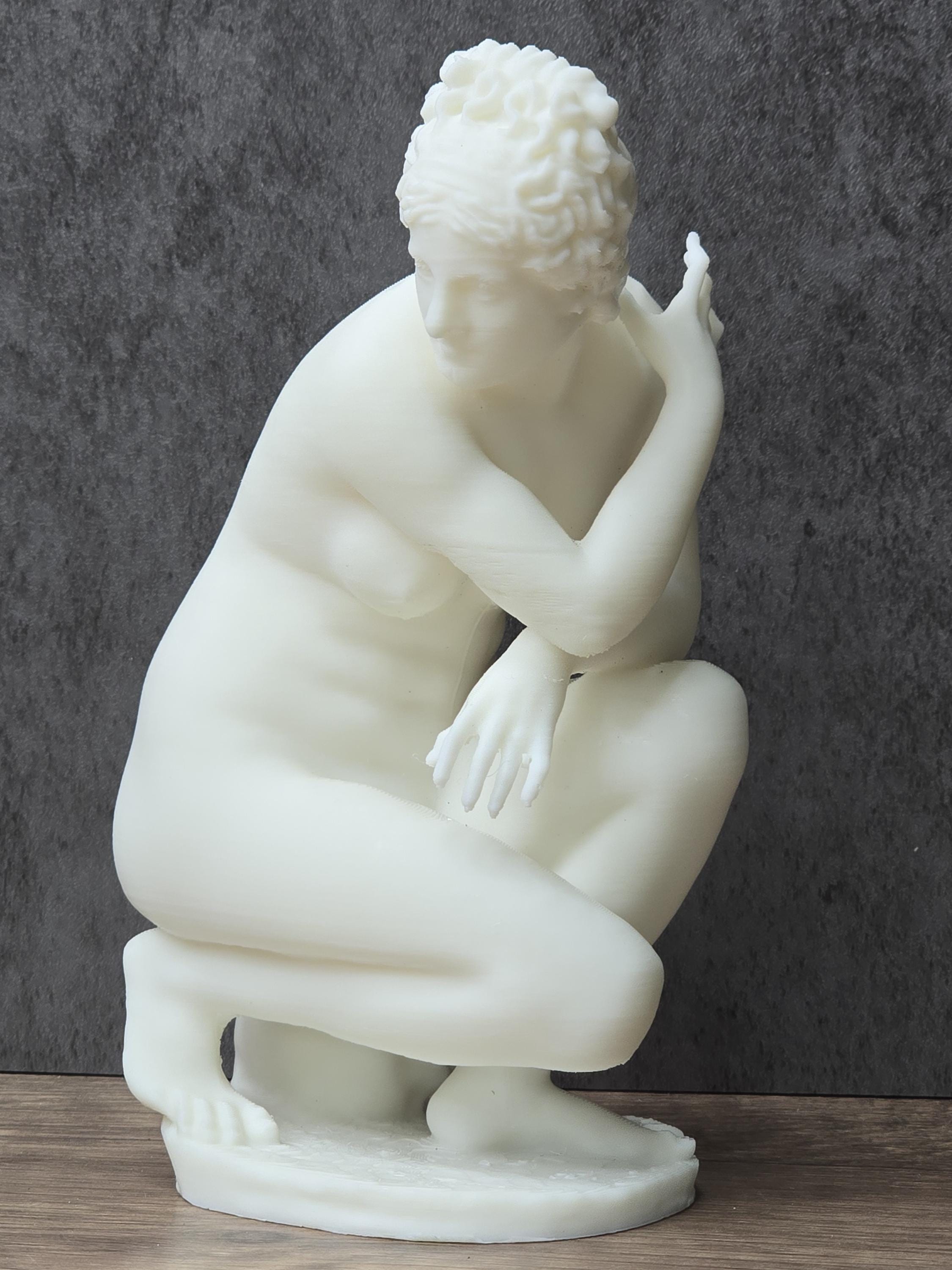 Venus Crouching Statue