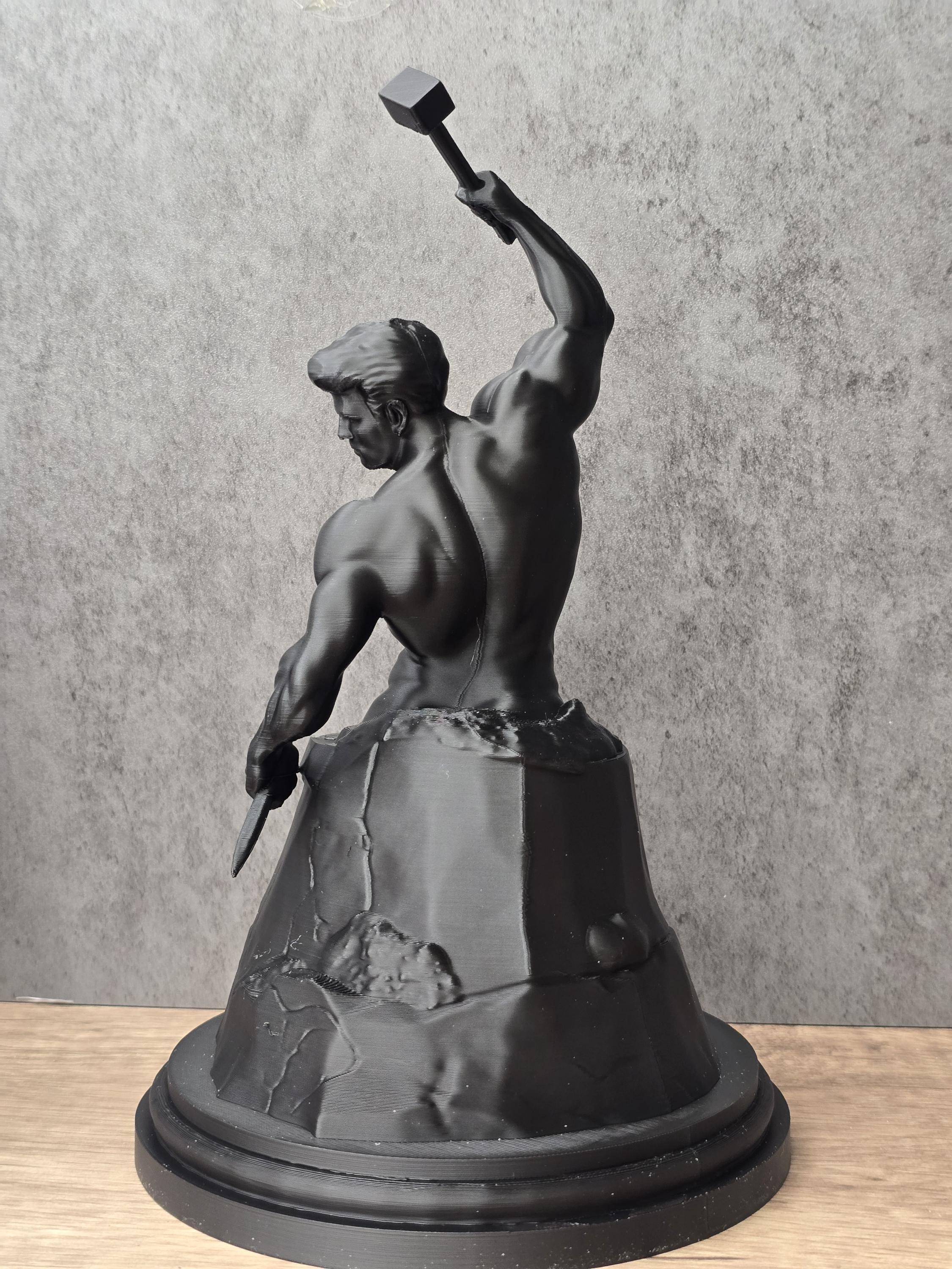 Self Made Man Statue