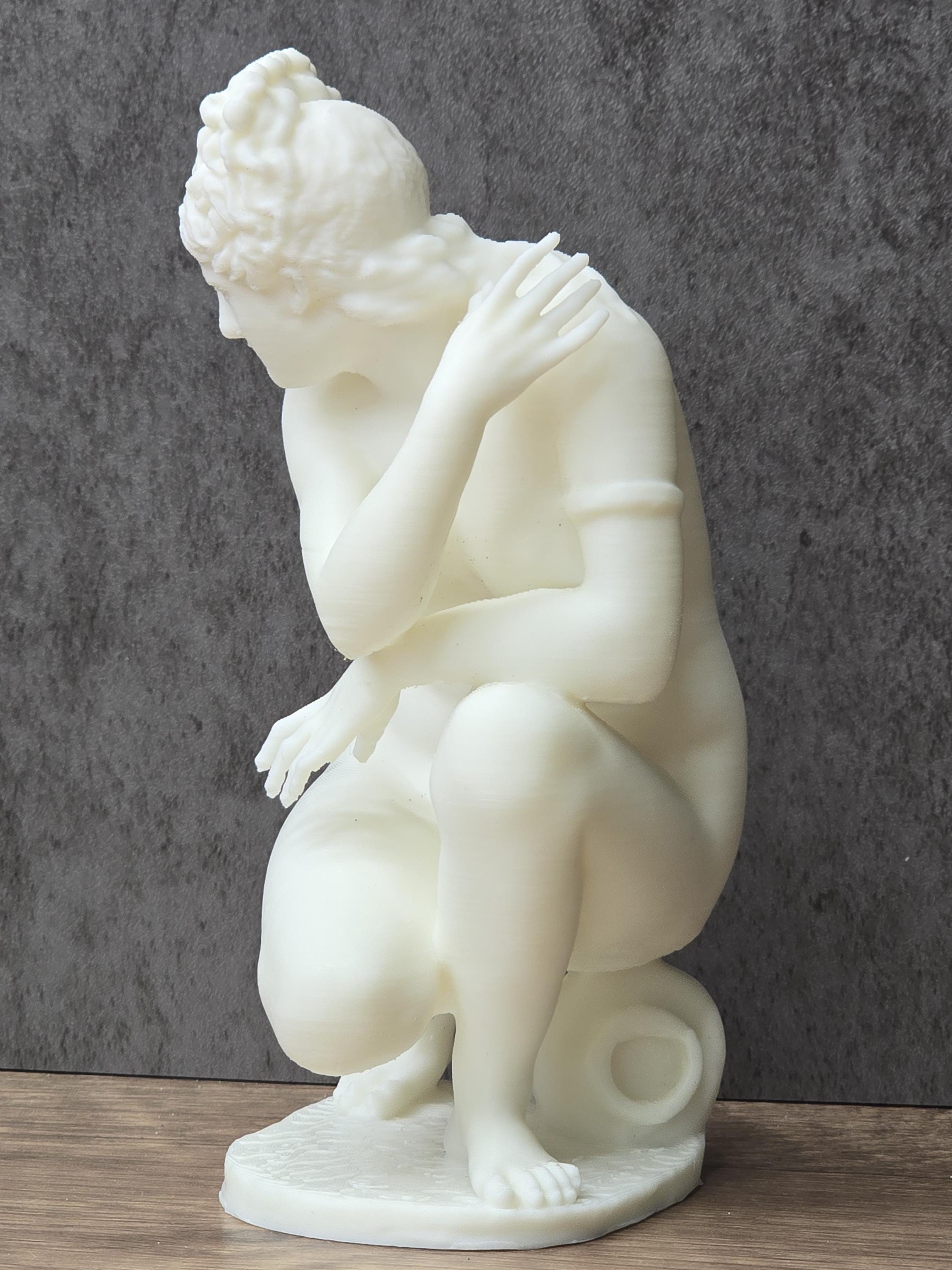 Venus Crouching Statue
